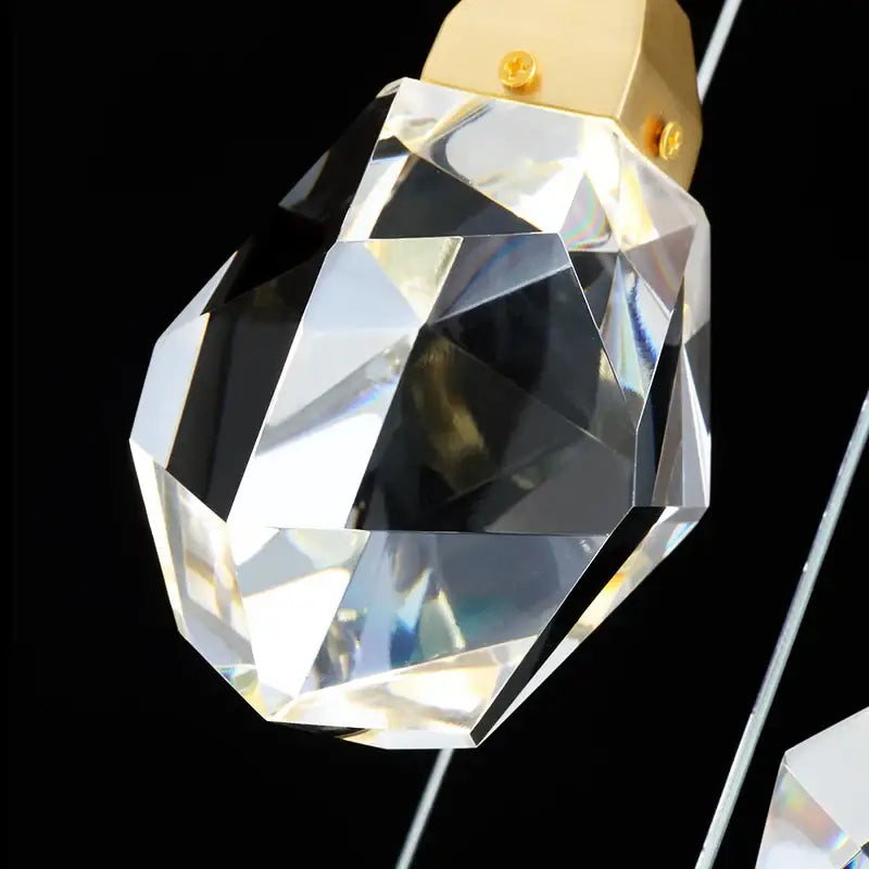Modern gold crystal aisle ceiling light featuring clear faceted crystal pendant with gold-toned metal cap ideal for hallways