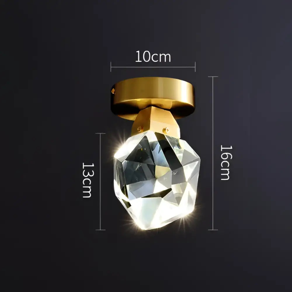 Modern gold crystal aisle ceiling light featuring a faceted glass globe and polished gold-toned mounting base decorbites crystal aisle