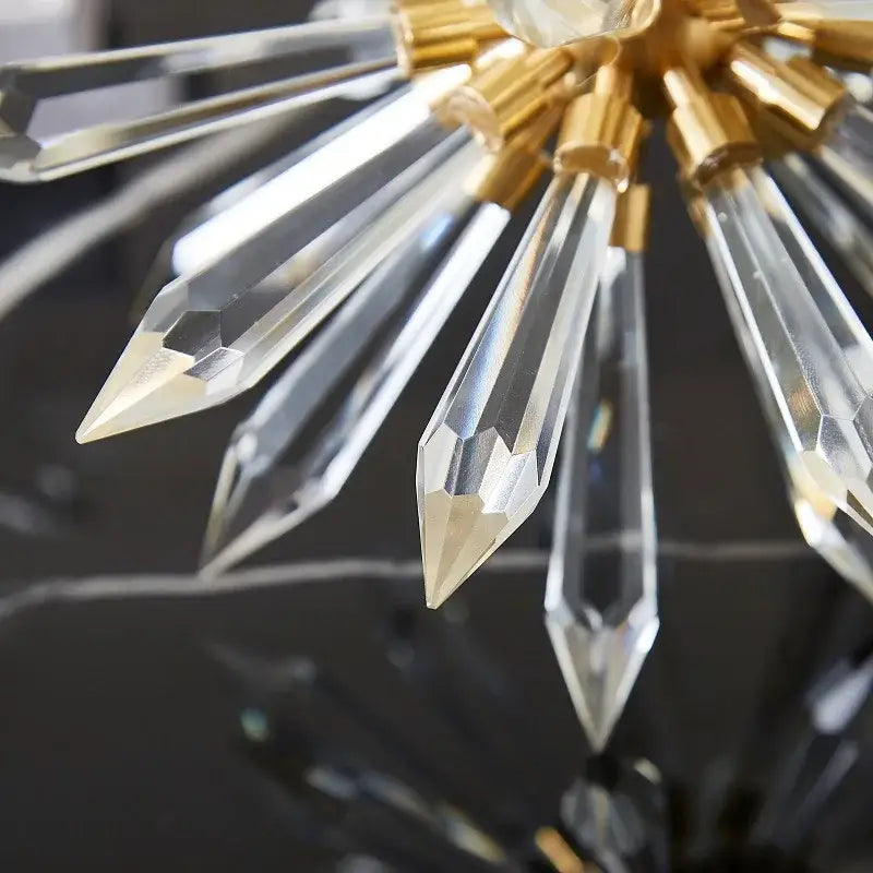A modern gold crystal ball acanthosphere chandelier with clear faceted prisms for elegant home decoration