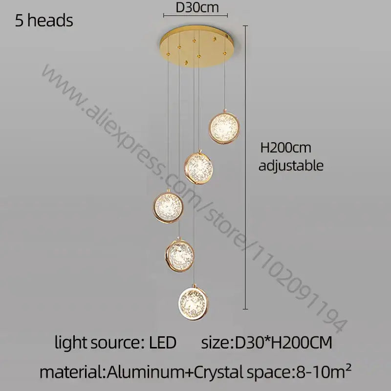 Modern gold crystal ball chandelier with five crystal-encrusted circular lights hanging from aluminum ceiling plate