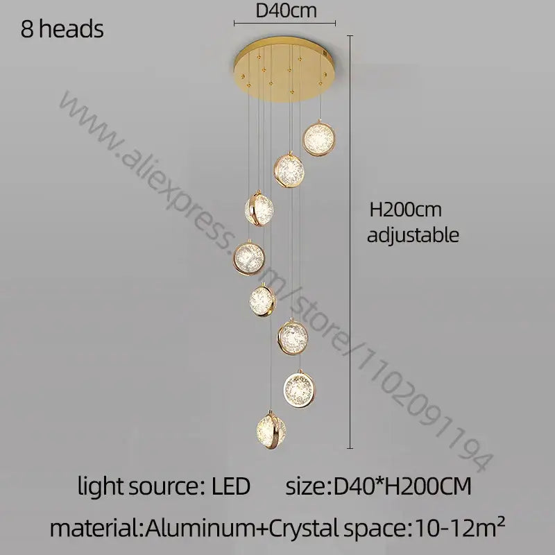 Modern gold crystal ball chandelier with eight circular led ball lights encased in crystal frames for staircase lighting