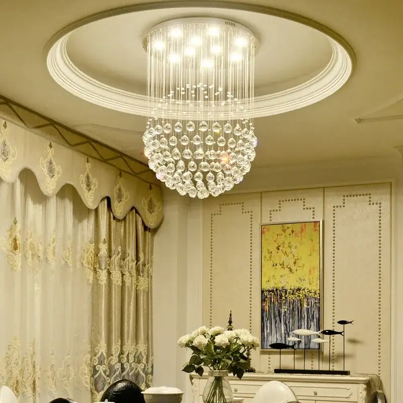 Modern gold crystal ball led chandelier with cascading clear faceted beads and teardrop crystals for dining room decorbites crystal ball led