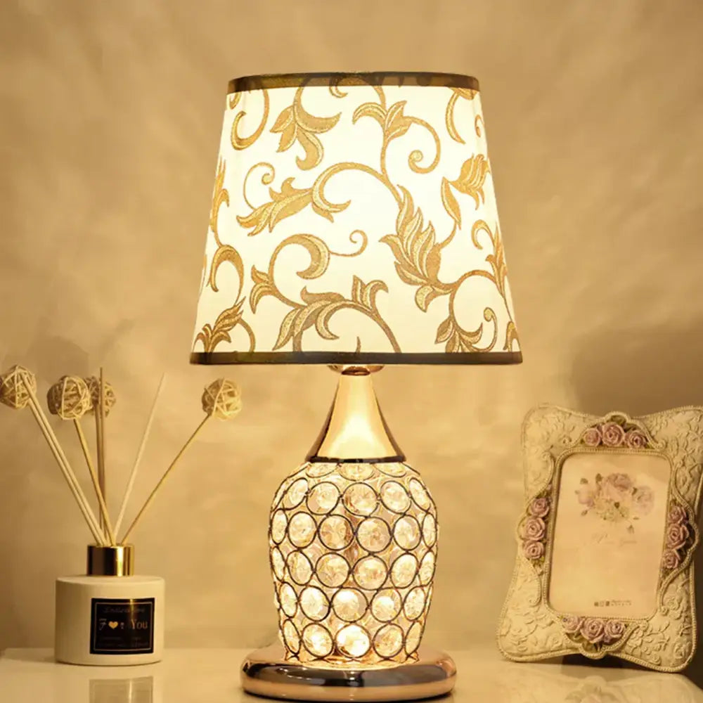 Modern gold crystal bedroom table lamp with a white lace shade and crystal-encrusted base for elegant decorbites crystal bedroom decor