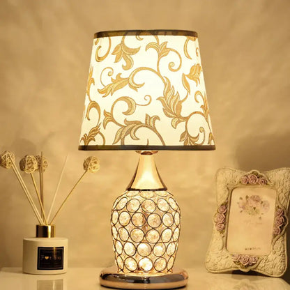Modern gold crystal bedroom table lamp with a white lace shade and crystal-encrusted base for elegant decorbites crystal bedroom decor