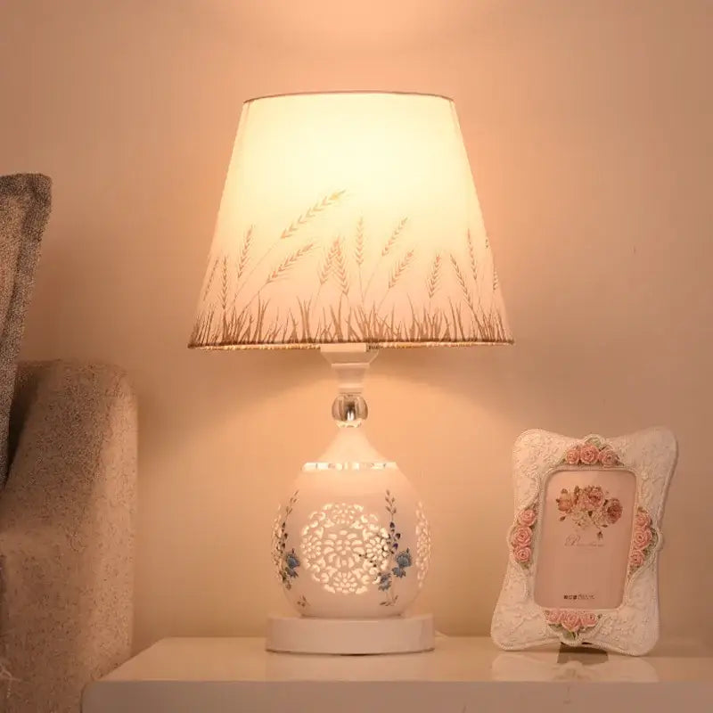 Modern gold crystal bedroom table lamp with delicate white ceramic lace shade and floral geometric cutouts for decorbites crystal bedroom