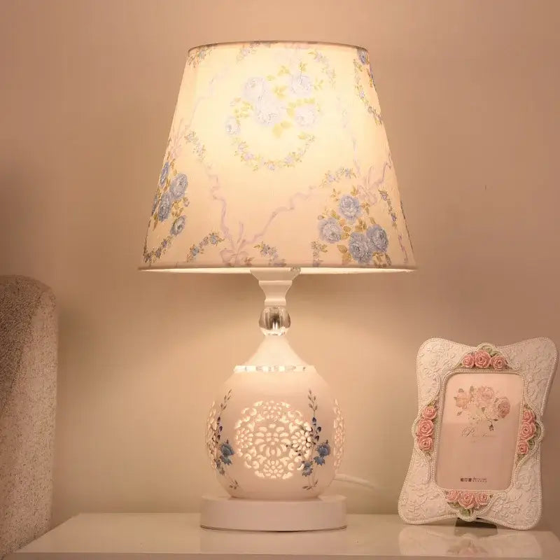 Modern gold crystal bedroom table lamp with white ceramic and blue floral cutouts and lace fabric shade decorbites crystal bedroom