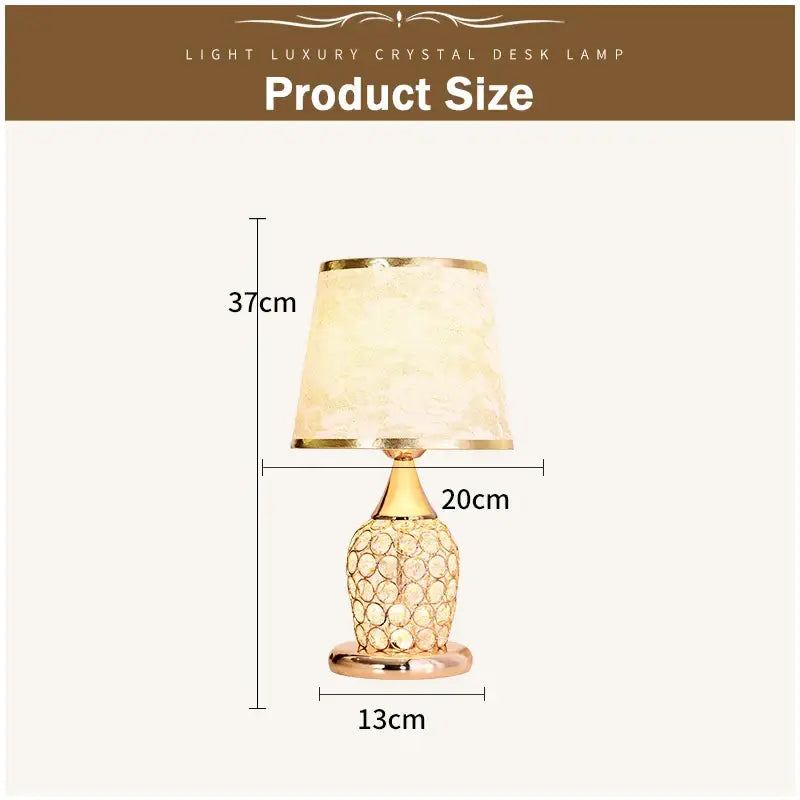 Modern gold crystal bedroom table lamp with a gold-toned faceted base and cream fabric lace shade for decorbites crystal bedroom decor