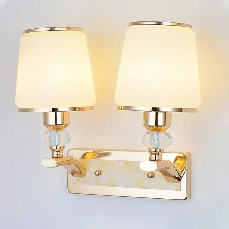 Modern gold crystal bedside wall sconce with fabric cream lampshades and crystal accents for bedroom decorbites crystal bedside