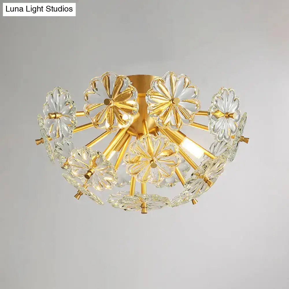 Gold-toned crystal bouquet ceiling lamp with clear flower-shaped glass elements and moderate fixture height for bedroom lighting