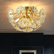 Gold-toned DecorBites™ crystal bouquet ceiling lamp with clear flower-shaped glass elements and fixture height for bedrooms