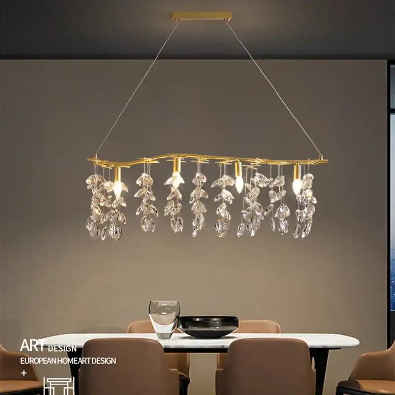 Modern gold crystal branch pendant chandelier with dangling crystal leaves and bulbs for dining room decorbites crystal branch