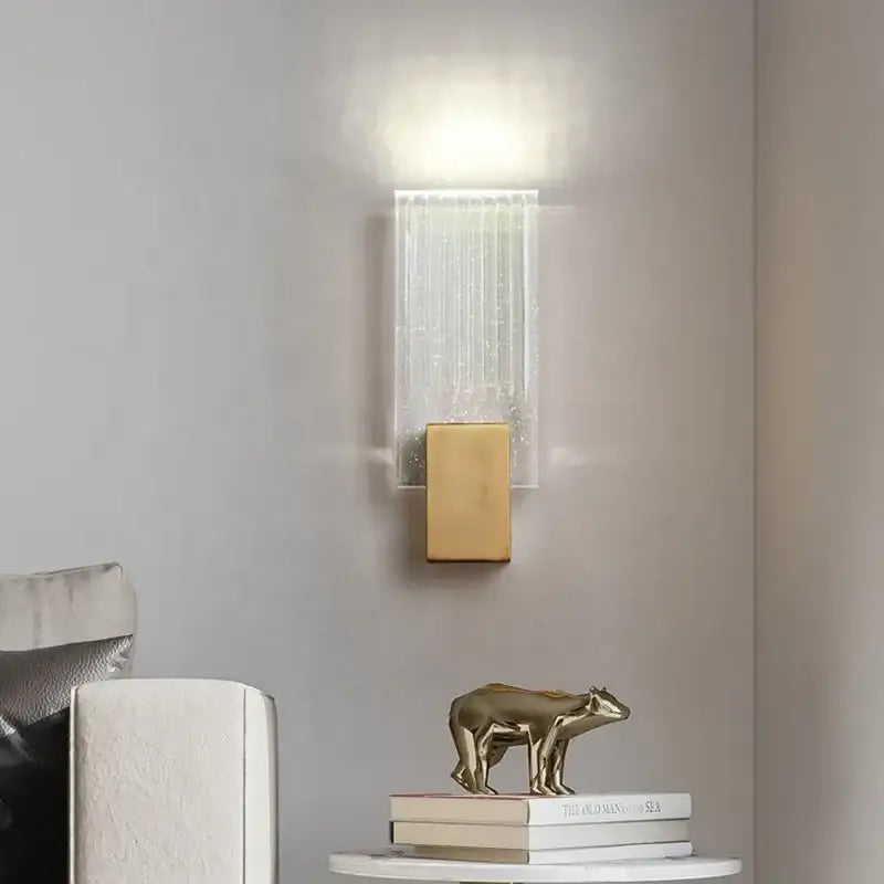 Modern gold crystal brass led wall lamp with clear vertically ribbed glass panel for luxury living room decorbites decor