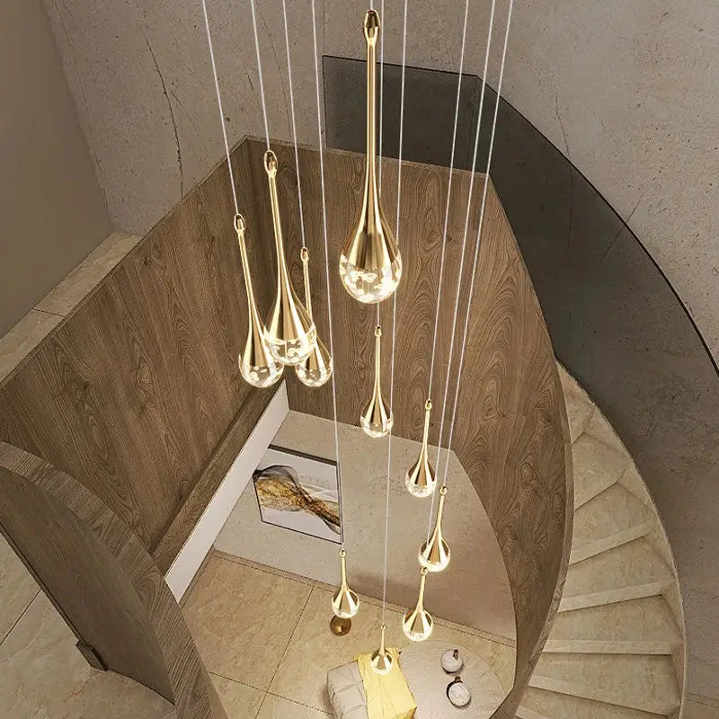 Modern gold crystal bubble chandelier with teardrop crystal bubble fixtures suspended by thin cords for dining room decorbites crystal bubble