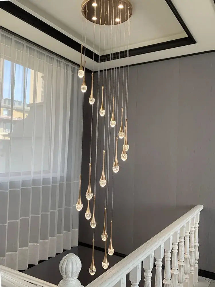 Modern gold crystal bubble chandelier featuring a teardrop pendant with crystal accents for living room decorbites crystal bubble lighting