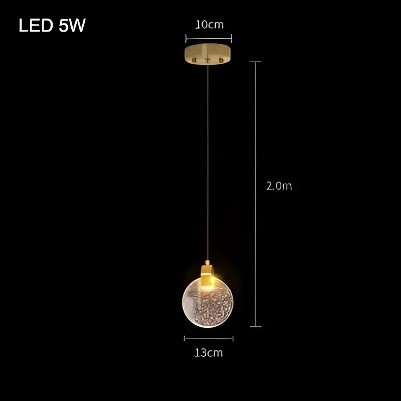 Modern gold crystal bubble pendant chandelier featuring a gold-toned bubble pendant chandelier with textured glass globe and 5w bulb