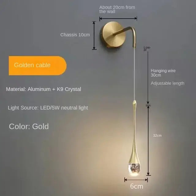 Modern gold crystal bubble pendant chandelier featuring a sleek teardrop crystal bubble pendant on adjustable aluminum cable
