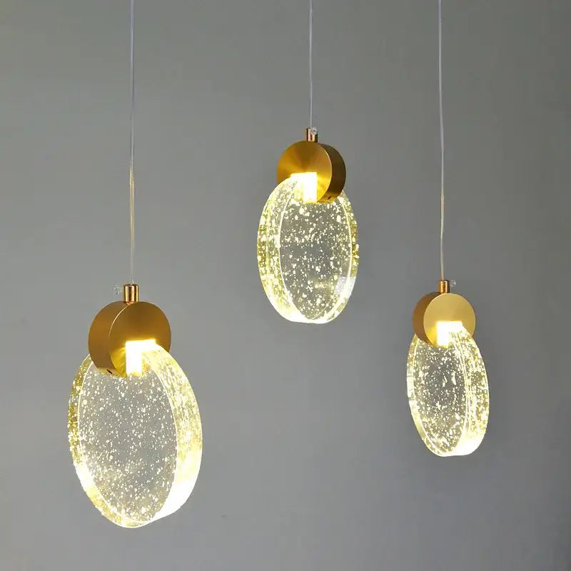 Three modern gold crystal bubble pendant lights with translucent speckled glass shades for dining room decorbites crystal bubble chandelier