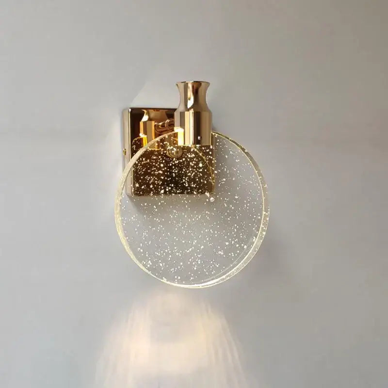 Modern gold crystal bubble wall lamp with gold-toned sconce and clear glass shade featuring sparkling decorbites crystal bubble design