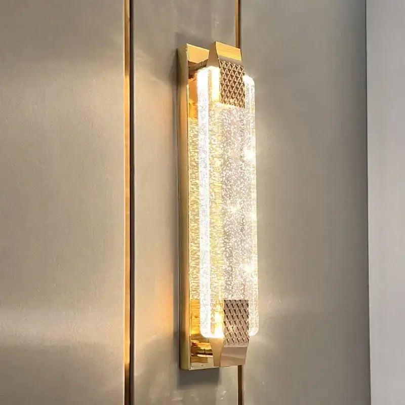Modern gold crystal bubble wall sconce with textured translucent crystal panel diffusing warm light for wall lights decorbites crystal bubble