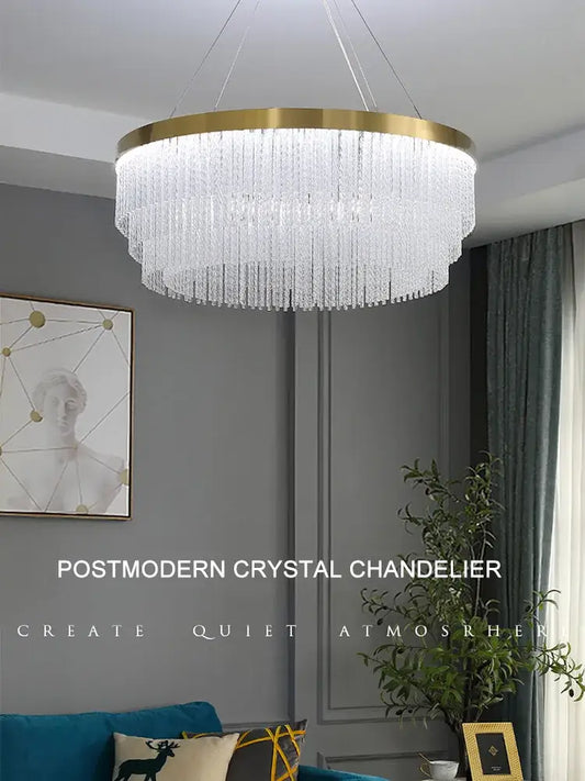 Modern gold crystal ceiling chandelier with a circular frame and cascading prisms pendant light for dining room decorbites