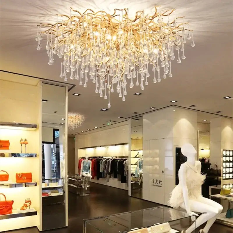 Modern gold crystal ceiling chandelier with branch design and dangling crystal droplets by decorbites crystal ceiling