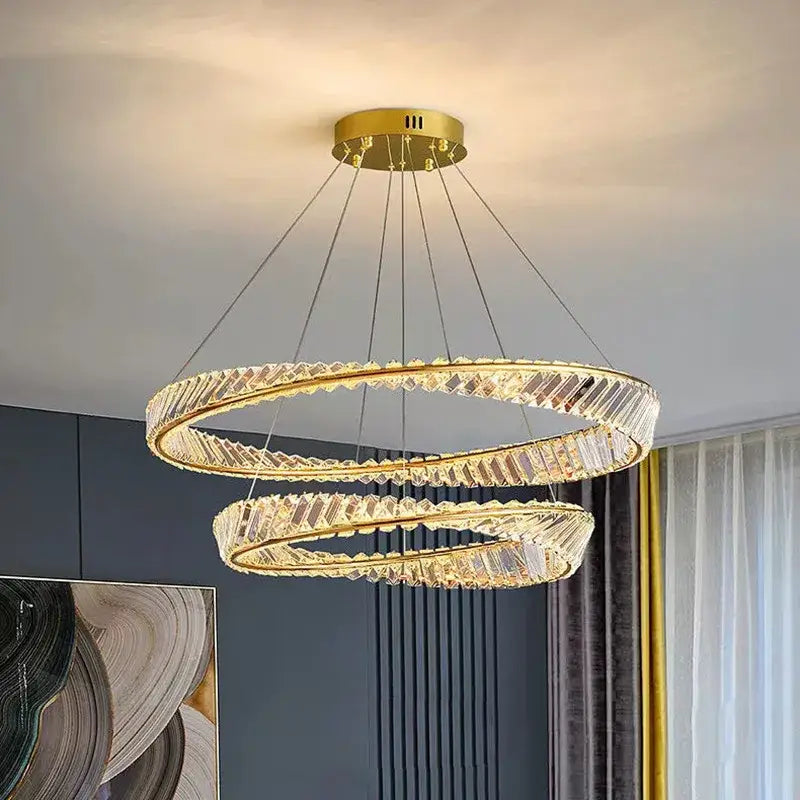 Modern gold ceiling pendant light featuring a double-ring design with crystal accents for living room decor
