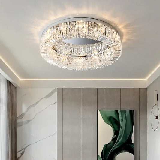 Modern gold crystal chandelier ceiling light with faceted crystals in a sleek metallic frame for elegant decorbites decor