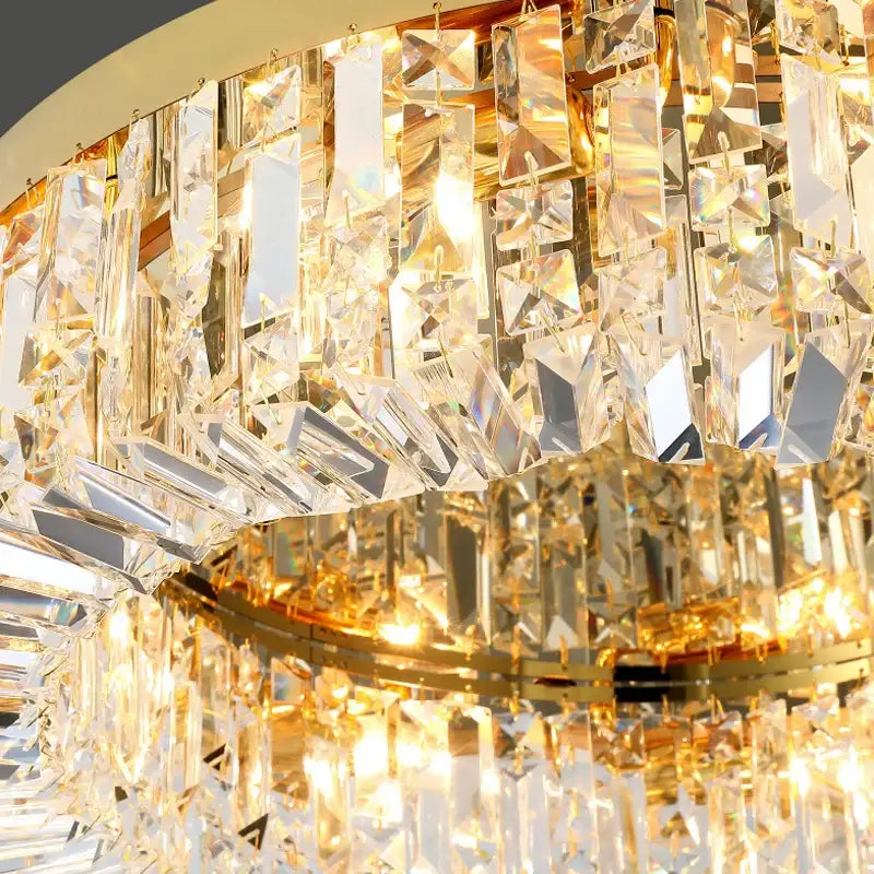 Modern gold crystal chandelier ceiling light with cascading faceted prisms for elegant dining room decorbites decor
