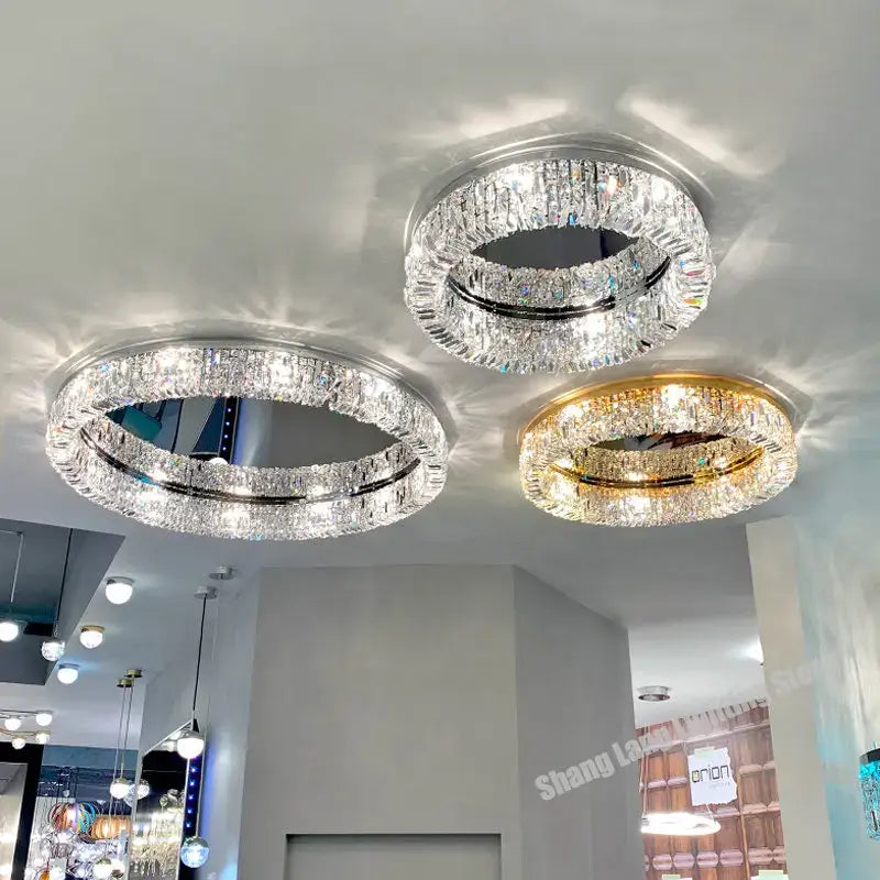 Modern gold crystal chandelier with clear and gold-toned frames featuring faceted crystals ceiling light decorbites elegant gold