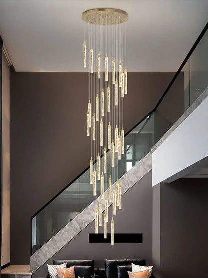 Elegant gold crystal chandelier with cascading cylindrical glass elements for luxury dining room decorbites crystal chandelier