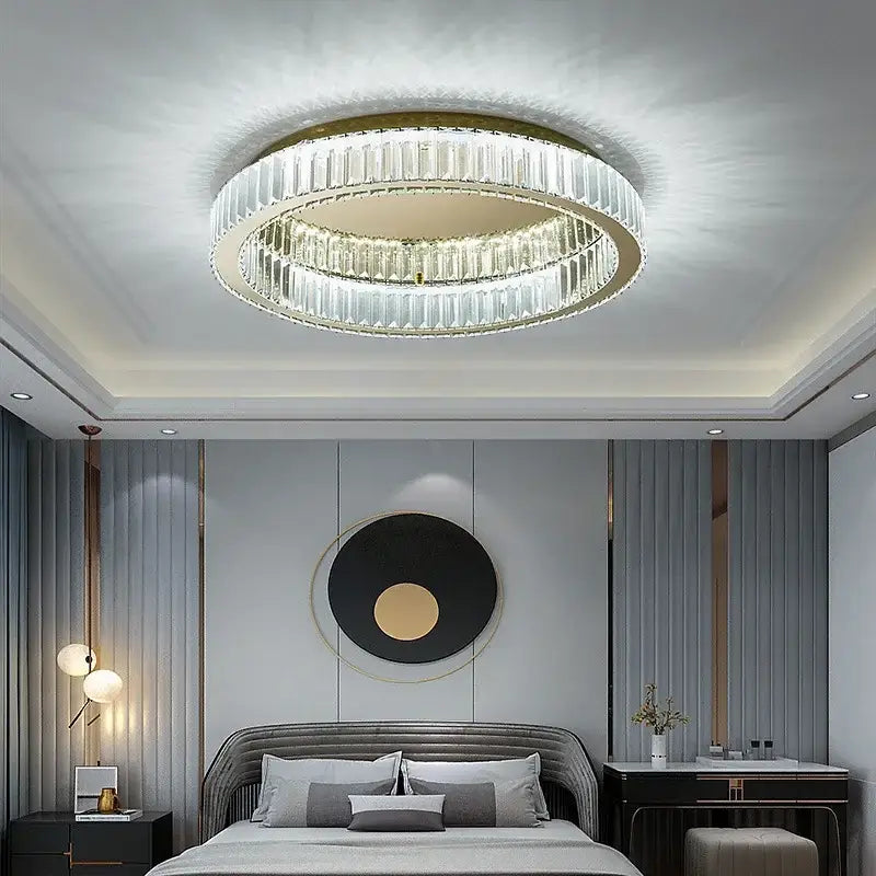 Modern gold crystal circle chandelier with two concentric rings of faceted crystals in a metal frame ceiling lamp