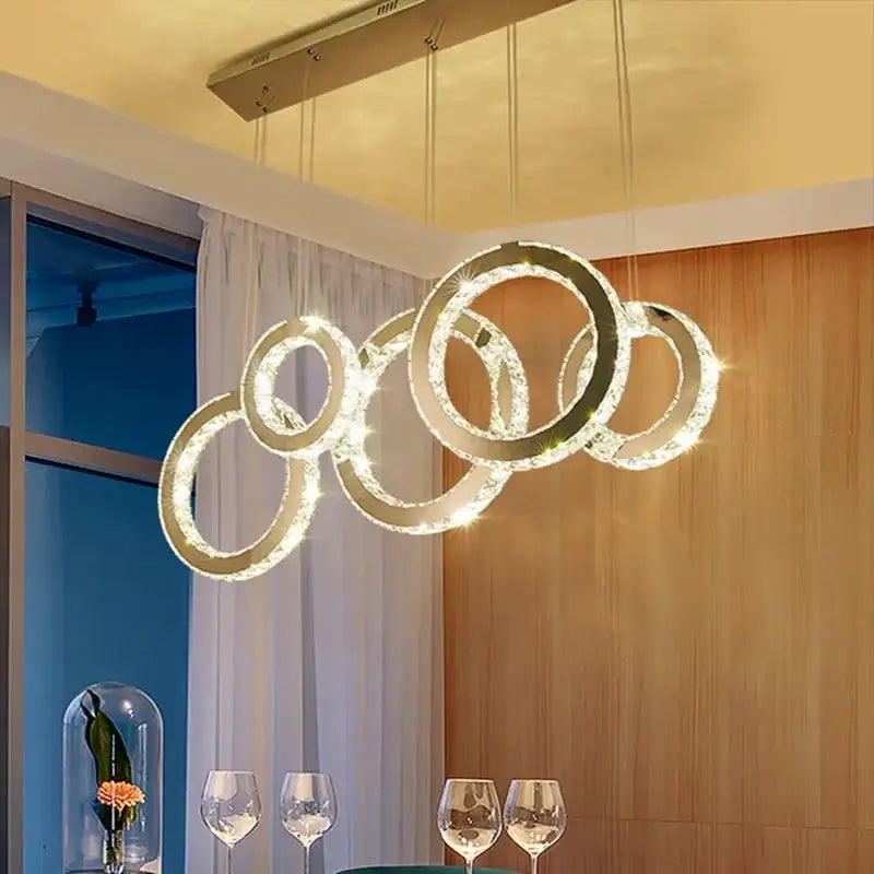 Modern gold crystal circle led pendant chandelier with interlocking rings and embedded led lights for dining room decorbites crystal circle