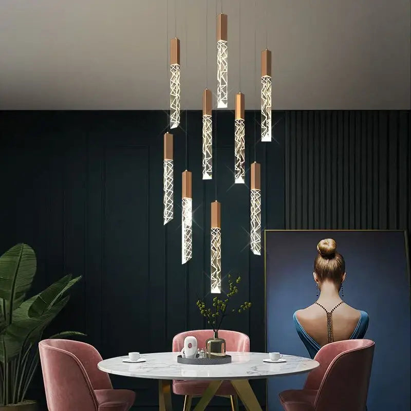 Modern gold crystal circular staircase chandelier with geometric pendant lights featuring white crystal patterns