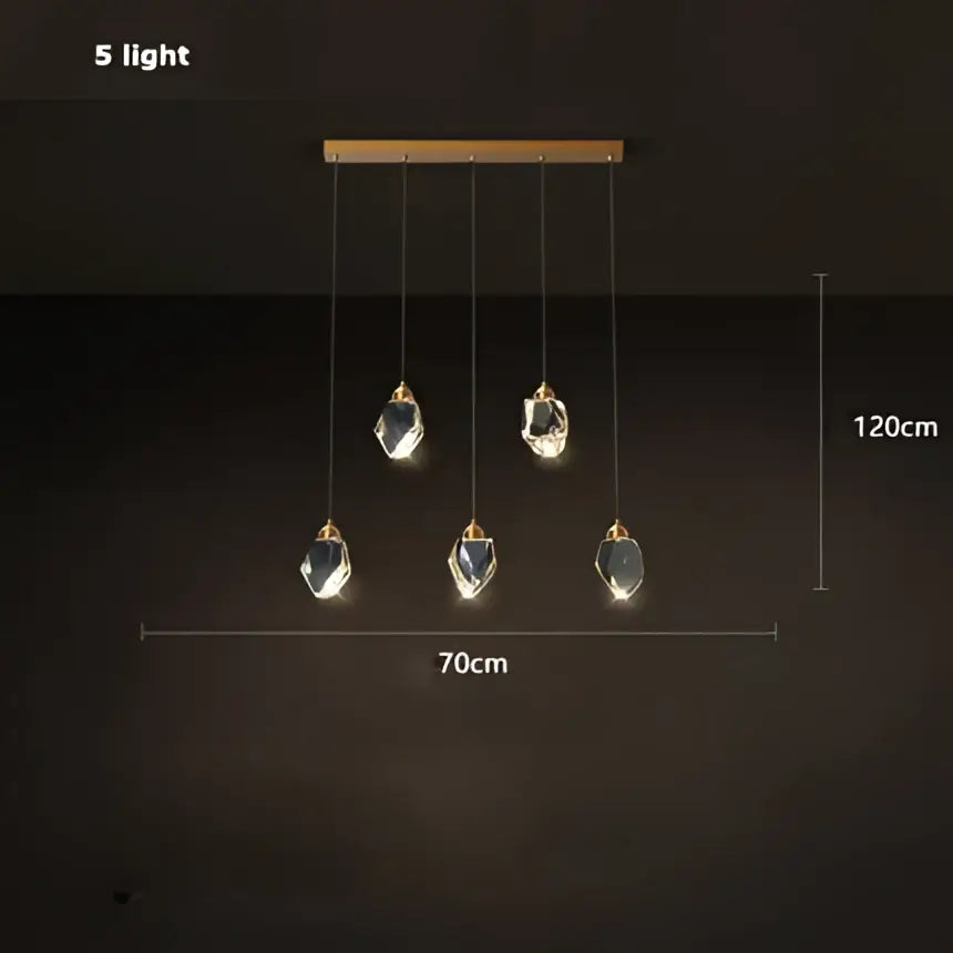 Modern gold crystal copper round chandelier with five lights, sleek wooden bar, and hanging crystal pendants for dining room decorbites crystal copper