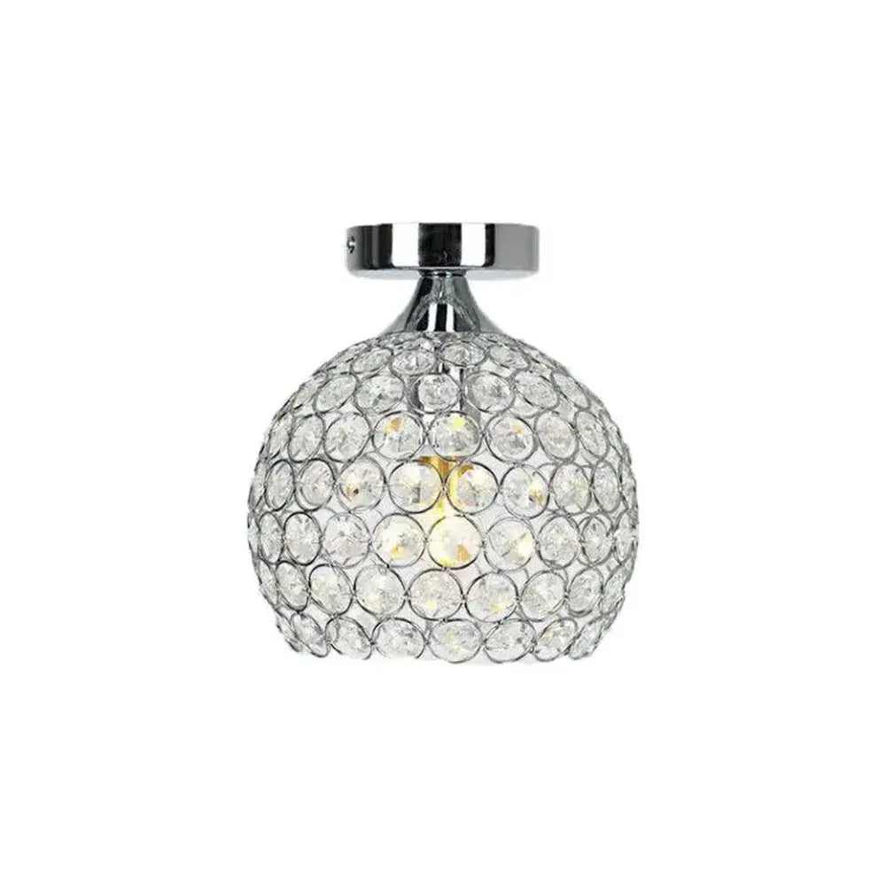 Modern gold crystal diamond ceiling light with chrome spherical design featuring clear faceted crystals for dining room