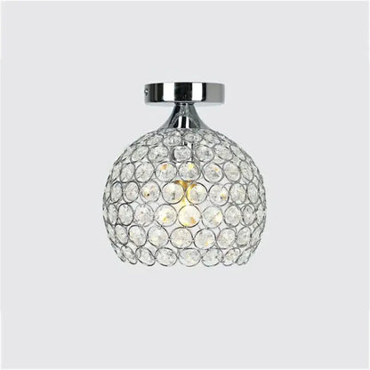 Modern gold crystal diamond ceiling light featuring spherical faceted crystals with chrome ceiling light mount for dining room