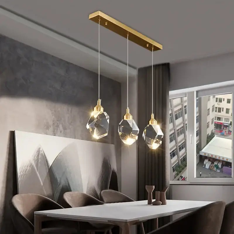 Modern gold crystal dining chandeliers featuring three faceted k9 crystal globes for bedroom and bar room decorbites k9 crystal