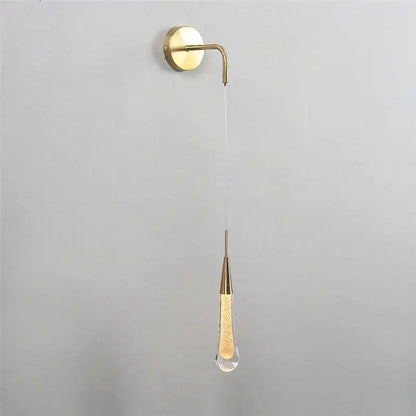 Modern gold crystal droplet wall lamp with a teardrop glass pendant filled with glowing golden beads for living room decorbites crystal droplet wall sconce