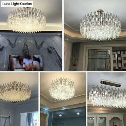 Crystal drum pendant light by decorbites featuring clear glass teardrop elements and metallic fixture for living room
