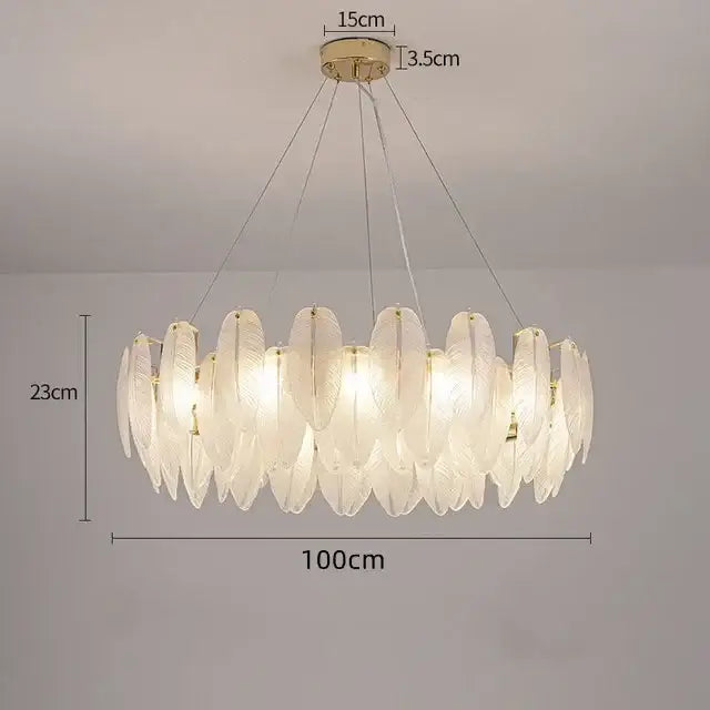 Modern gold crystal feather chandelier with translucent glass feather shades in a circular brass fixture for living room decorbites crystal feather