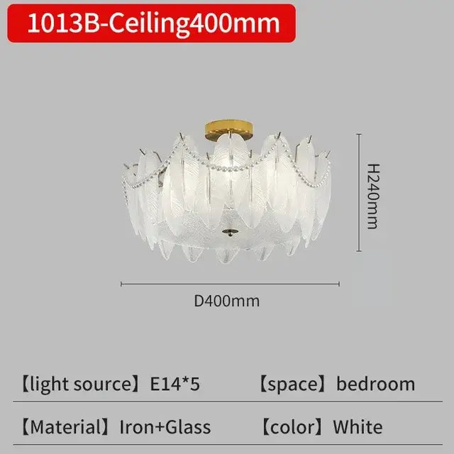 Modern gold crystal feather chandelier pendant light with white ceiling mount and glass feather-like shades decorbites crystal feather