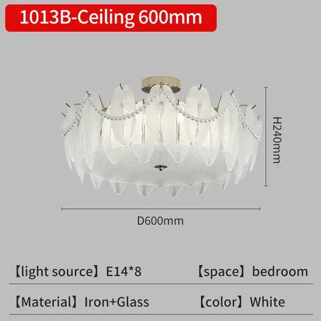 Modern gold crystal feather chandelier pendant light with white feather-shaped glass and iron frame by decorbites crystal feather