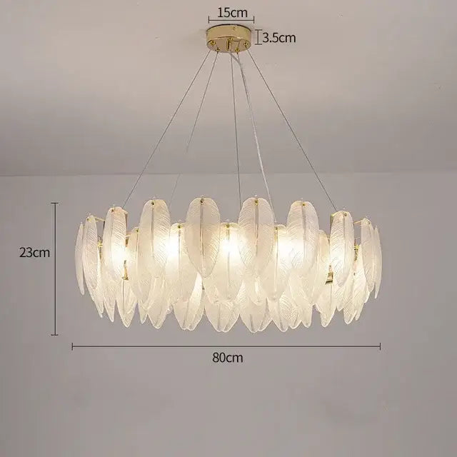 Modern gold crystal feather chandelier with translucent leaf-shaped glass panels and gold-toned metal accents by decorbites crystal