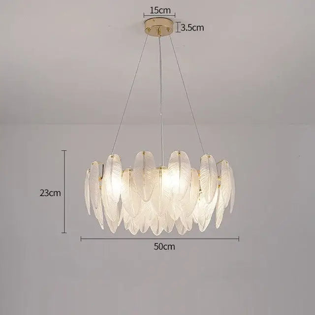 Modern gold crystal feather chandelier with translucent feather-shaped glass shades decorbites crystal feather design