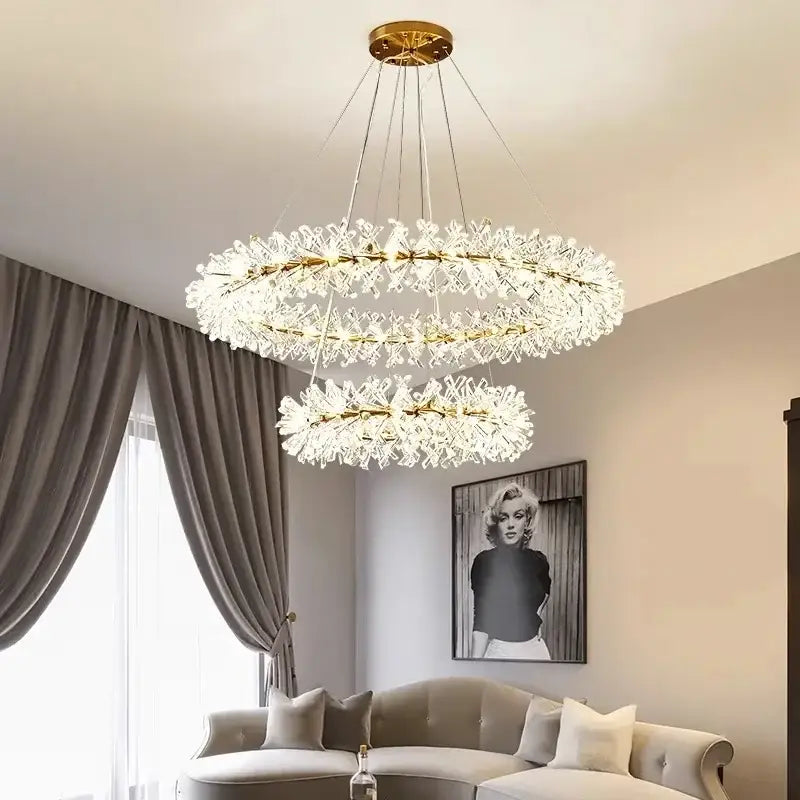 Modern gold crystal flower chandelier with double-tiered gold-toned frames and cascading clear crystals decorbites crystal flower