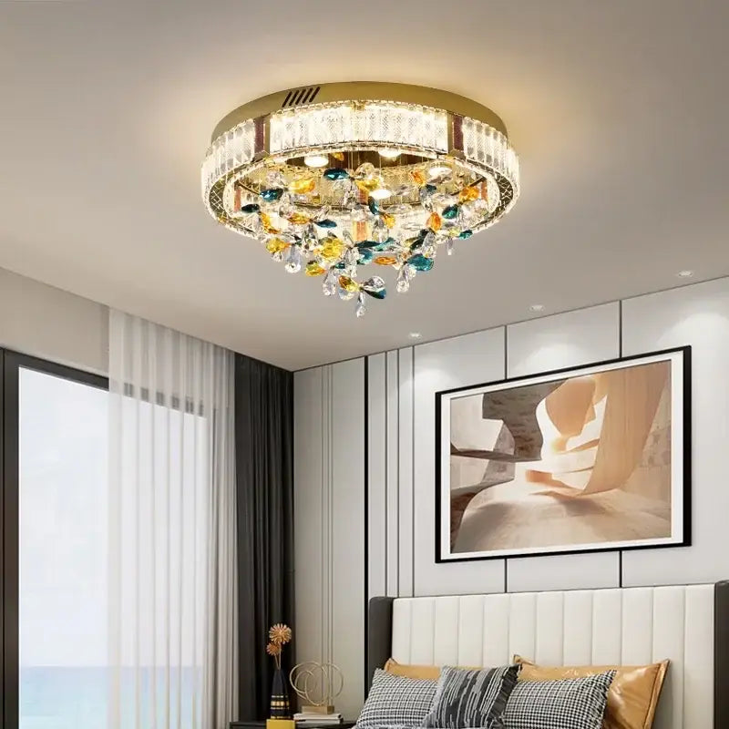 Modern gold-toned crystal flower led ceiling light with colorful leaf-shaped accents for stylish living room decorbites decor