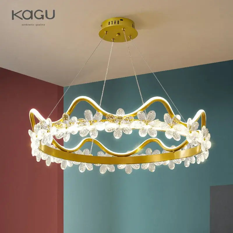 Modern gold crystal flower ring chandelier with gold-toned crown design and led-illuminated decorbites crystal flower accents