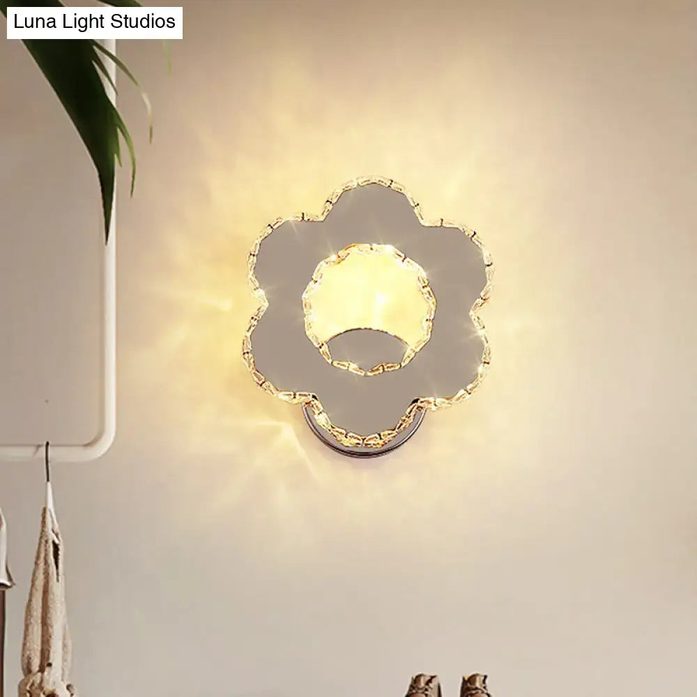 Modern gold crystal flower wall sconce with chrome finish emits warm white light for 110v-120v bedroom use