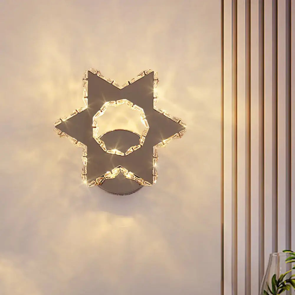 Modern gold crystal flower wall sconce with sleek chrome finish and warm white light for 110v-120v bedroom use