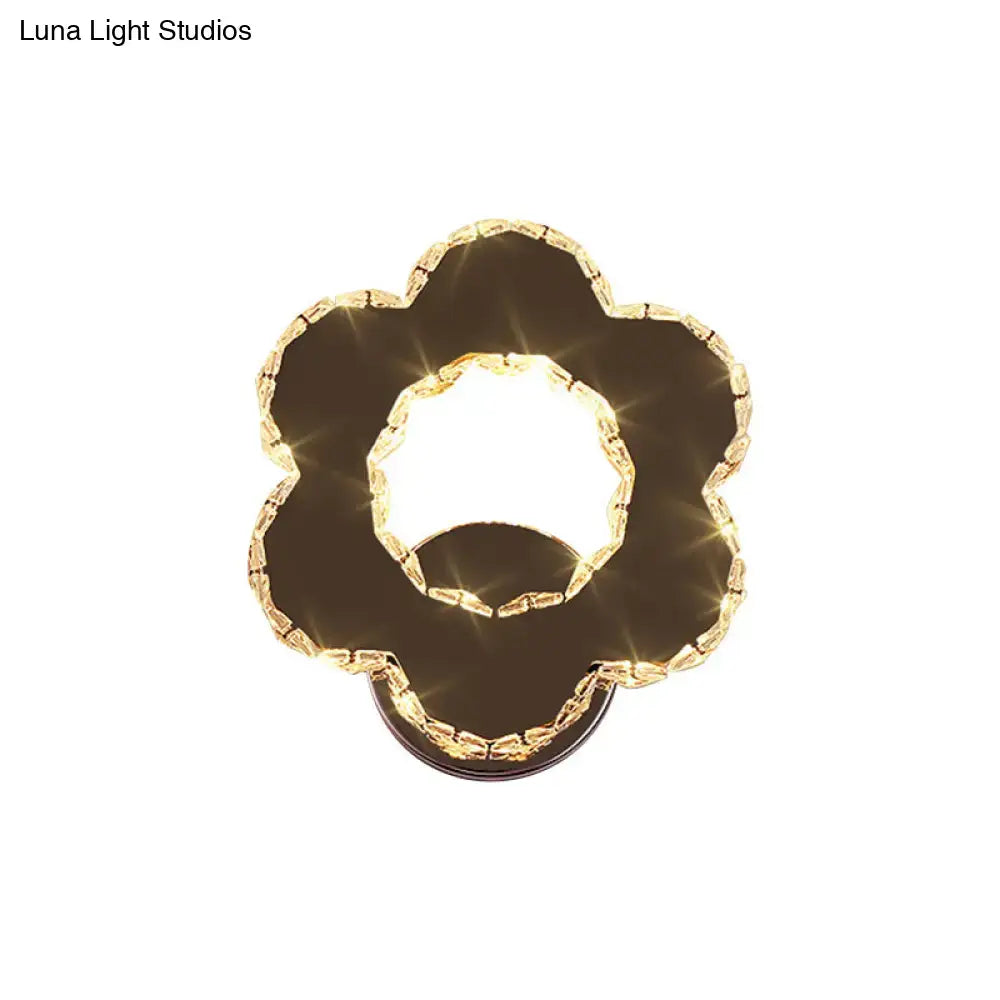 Modern gold crystal flower wall sconce with warm white light and sparkling accents for 220v-240v bedroom use